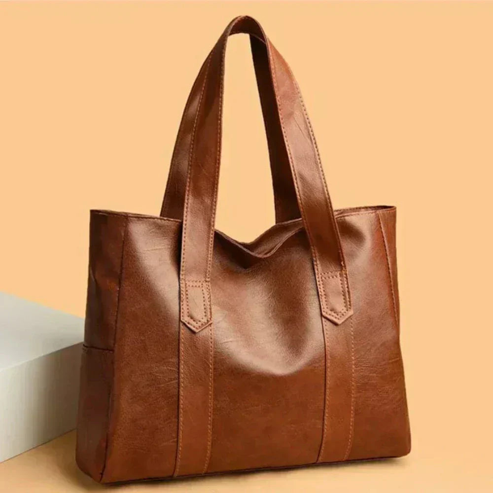 Lucia — Geantă de mână elegantă cu design minimalist
